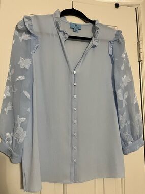 Cece Light Blue Ruffle V-Neck Blouse with Sheer Embroidered Sleeves